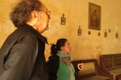 Artist Denis Pondruel and Irene Biolchini observing the interior of the Church of St. Peter in Chains